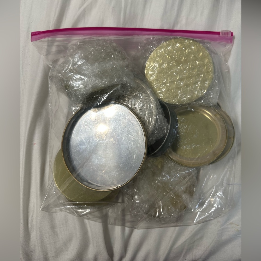 Bag of 15 candle tops for artists in gold, tin, and silver
